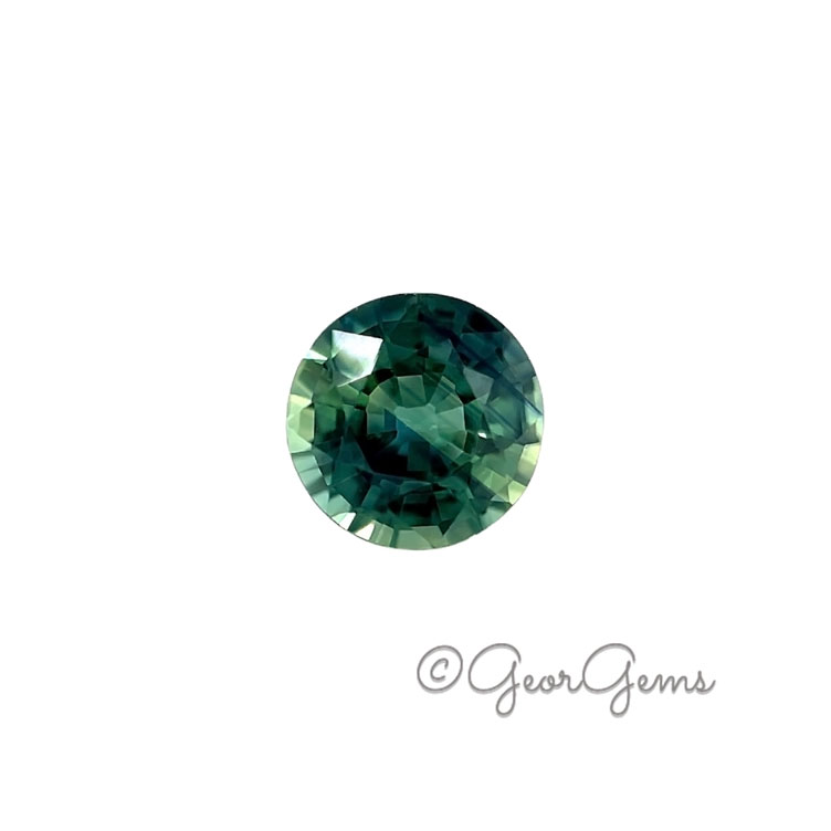 Teal-Sapphire-23076 0.61ct Teal Sapphire - Round