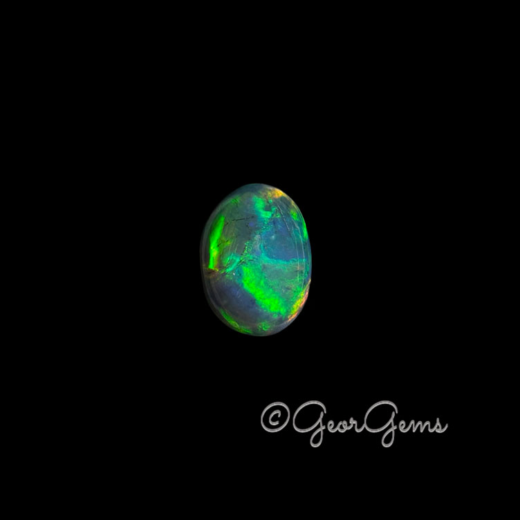 25655 3.39ct Black Opal - Oval Cabochon