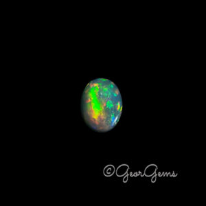 2.79ct Black Opal - Oval Cabochon