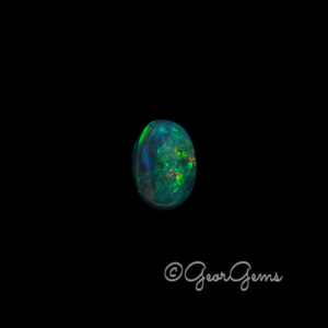 3.05ct Black Opal - Oval Cabochon