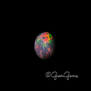 4.44ct Black Opal - Oval Cabochon