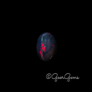 5.38ct Black Opal - Oval Cabochon