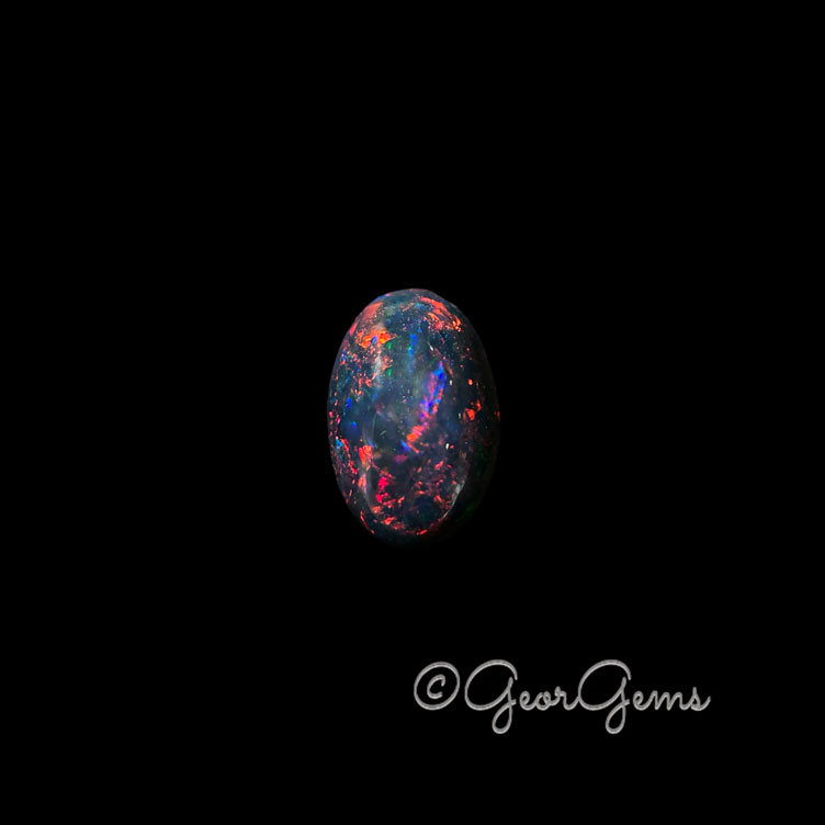 26473 4.96ct Black Opal - Oval Cabochon