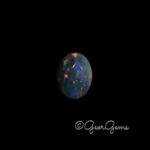 3.46ct Black Opal - Oval Cabochon