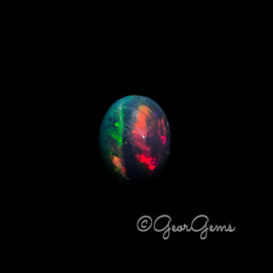 4.54ct Black Opal - Oval Cabochon