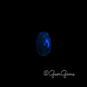 5.70ct Dark Blue Opal - Oval Cabochon