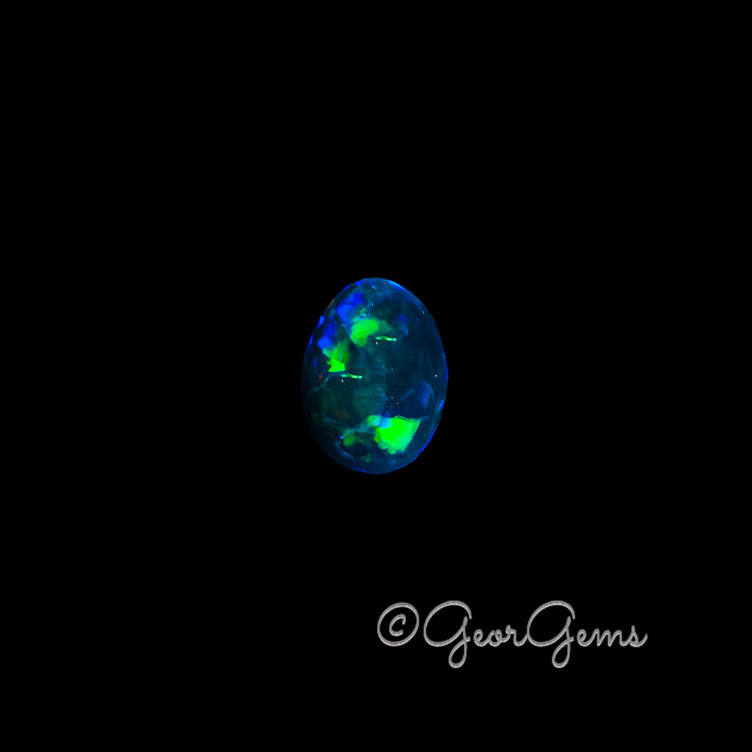 26429 2.31ct Dark Blue Opal - Oval Cabochon