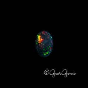 3.60ct Black Opal - Oval Cabochon
