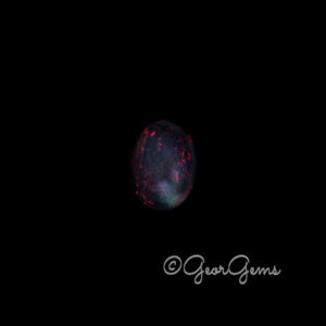 6.08ct Black Opal - Oval Cabochon