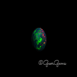 3.90ct Black Opal - Oval Cabochon