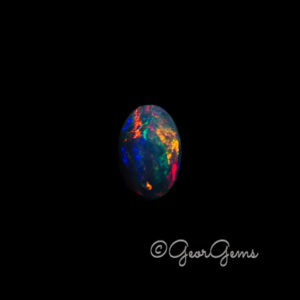 3.92ct Black Opal - Oval Cabochon