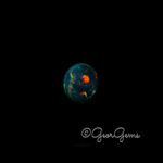 3.76ct Black Opal - Oval Cabochon