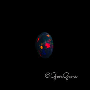 3.58ct Black Opal - Oval Cabochon
