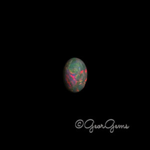 1.97ct Black Opal - Oval Cabochon