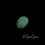 12.45ct Black Opal - Oval Cabochon - Image 3