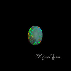 12.45ct Black Opal - Oval Cabochon