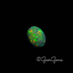 11.83ct Black Opal - Oval Cabochon