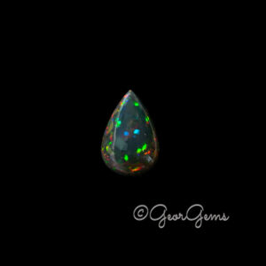 28.94ct Black Opal - Pear Cabochon