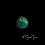 11.28ct Black Opal - Round Cabochon - Image 2