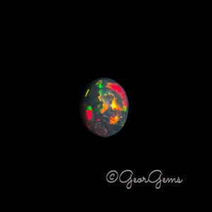 7.96ct Black Opal - Oval Cabochon