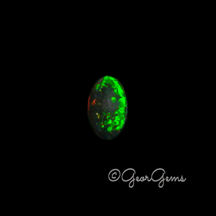 28019 8.62ct Black Opal - Oval Cabochon