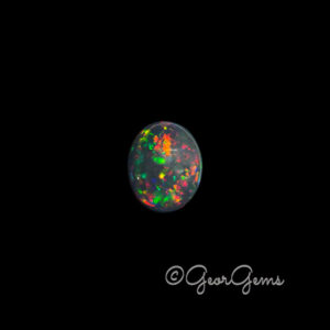 7.68ct Black Opal - Oval Cabochon