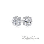 Beautiful Sterling Silver Eternal Love Moissanite Earrings featuring a brilliant 4mm center stone surrounded by sparkling 1mm accent moissanites in an elegant infinity knot design. Crafted in 925 sterling silver.