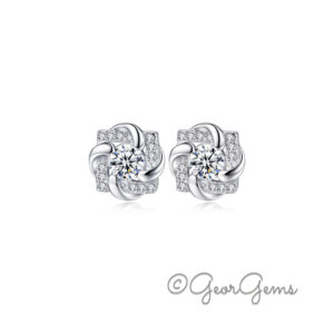 Beautiful Sterling Silver Eternal Love Moissanite Earrings featuring a brilliant 4mm center stone surrounded by sparkling 1mm accent moissanites in an elegant infinity knot design. Crafted in 925 sterling silver.