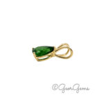 Side view of Tsavorite pear pendant in 9k yellow gold