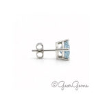 Side view of Aquamarine oval studs in sterling silver