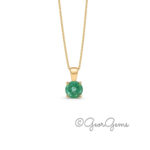 5.5mm emerald pendant on a 9k yellow gold anchor chain