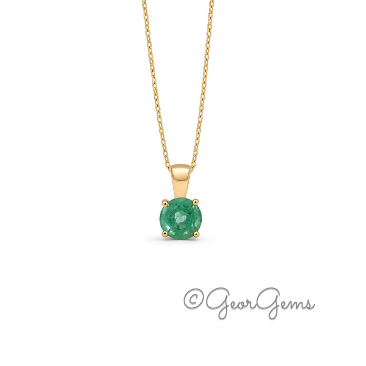 5.5mm Emerald Pendant with Chain Front View 5.5mm emerald pendant on a 9k yellow gold anchor chain