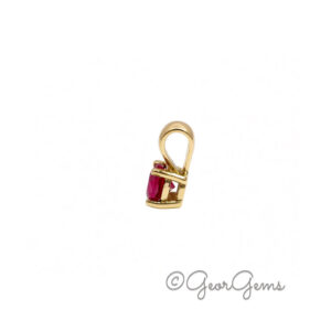 Side view of a 4mm ruby pendant in 9k yellow gold