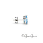 Side view of Swiss Blue Topaz studs in sterling silver