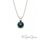 Teal sapphire pendant on a 9k white gold anchor chain
