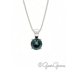 Teal sapphire pendant on a 9k white gold anchor chain