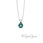 5mm teal sapphire pendant on a 9k white gold anchor chain