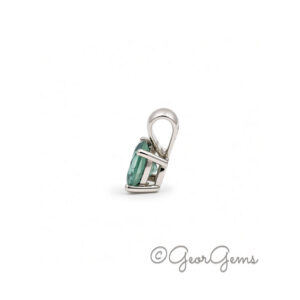 Side view of a 5mm teal sapphire pendant in 9k white gold